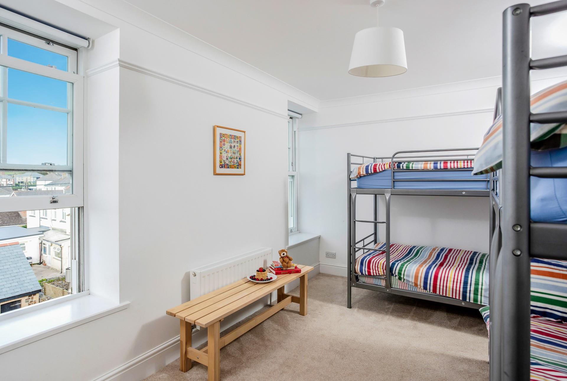 Tuck the kids into bed after a fun-filled day on the beach. 