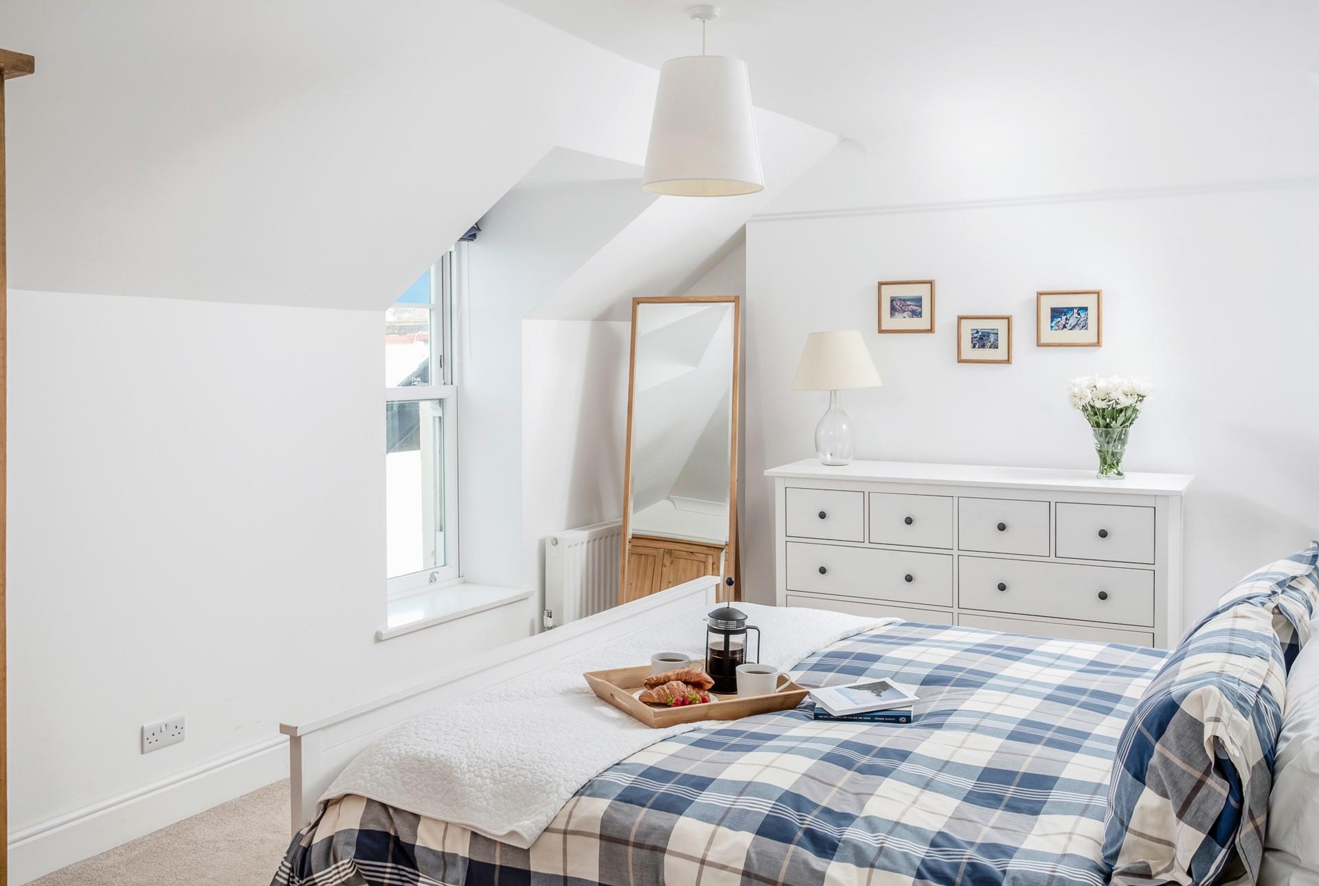 Climb into the spacious king size bed for a dreamy night's slumber.