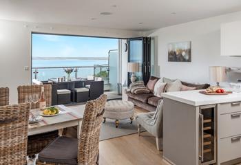 Cook, eat and unwind in the living area, making the most of the view.