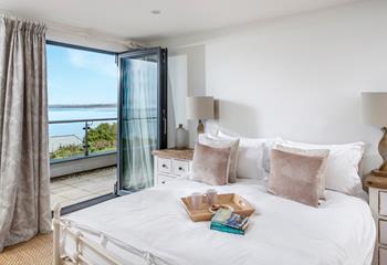 Let the sea air in, as you relax in the master bedroom.
