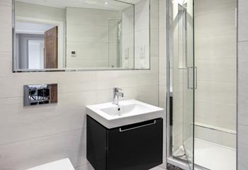 Step from the comfortable king-size bed and into the stylish en-suite.