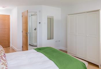 An en-suite and a sea view, the master bedroom is a relaxing retreat.