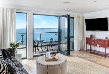 Far-reaching sea views await at this stylish coastal penthouse.