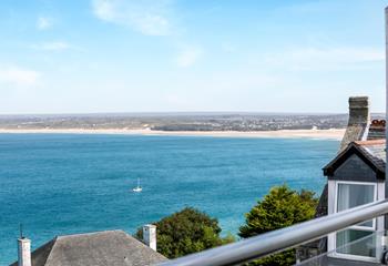 Take in the golden sands of Hayle's stunning beach, watching as boats sail by and the tide comes and goes.