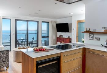 Admire the view as you cook in the sleek kitchen.