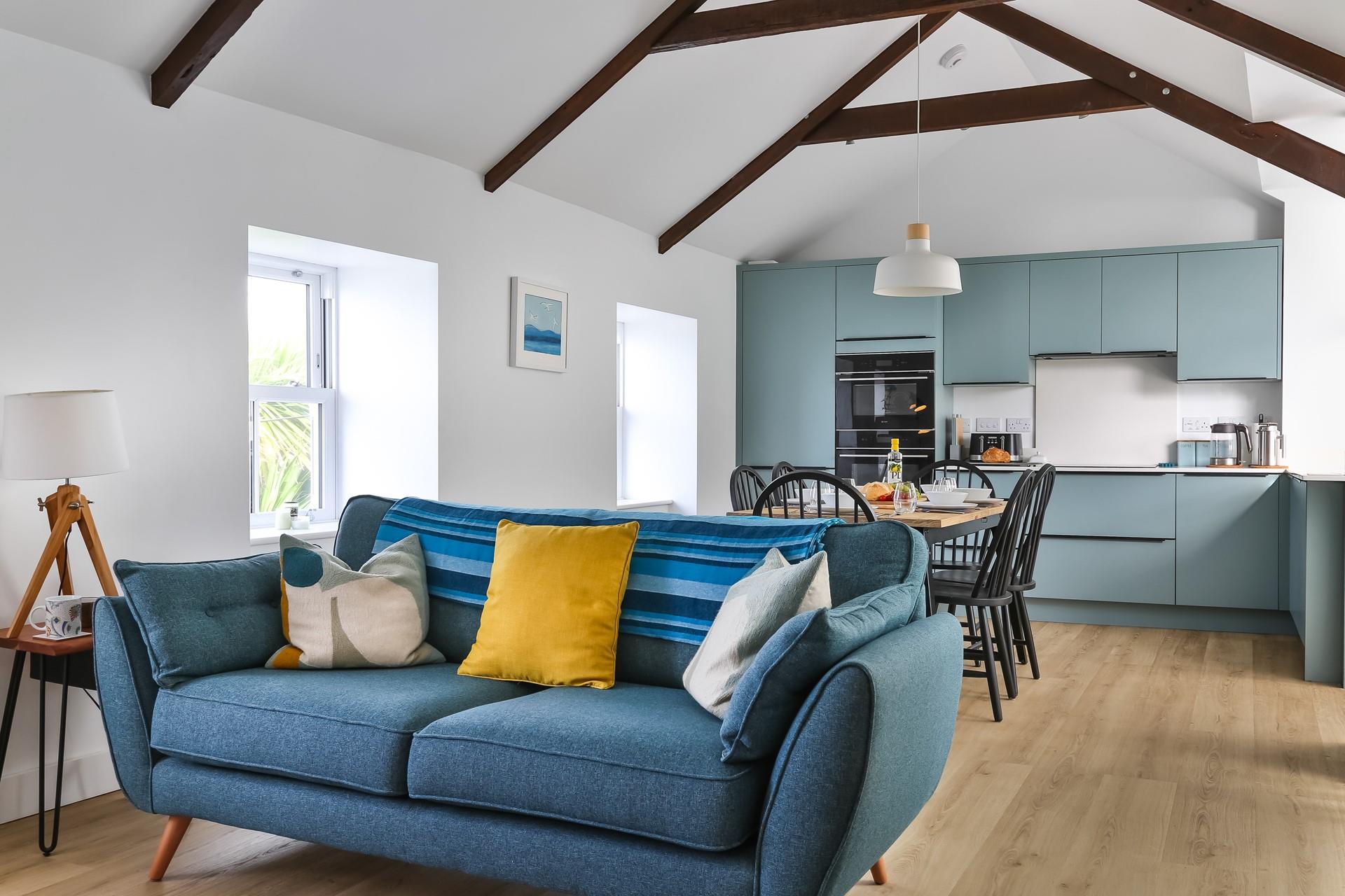 The open plan living space is spacious and stylish.