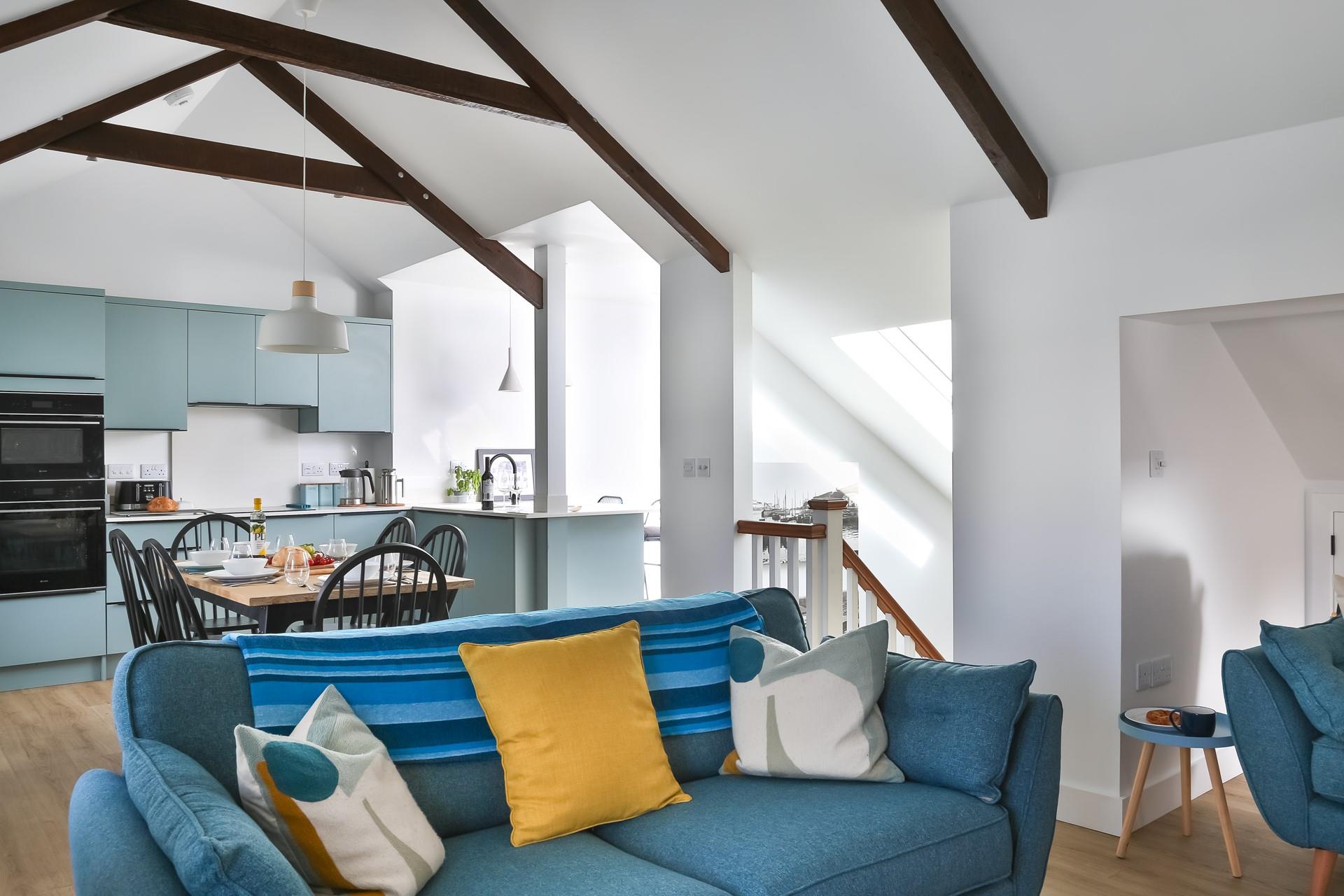 Blue and yellow tones reflect the seaside location.