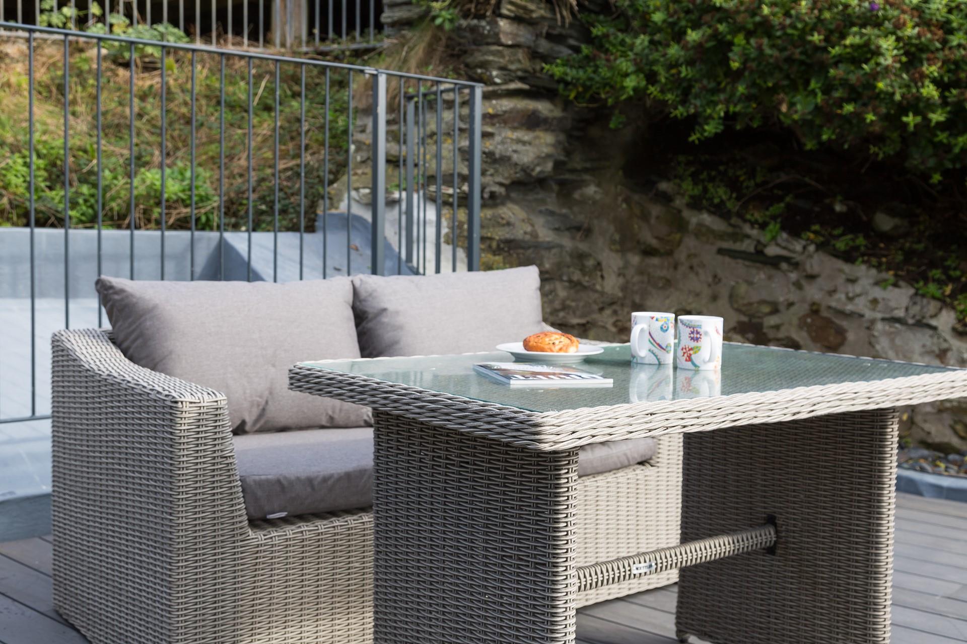 Soak up the summer sunshine on the decking each morning.