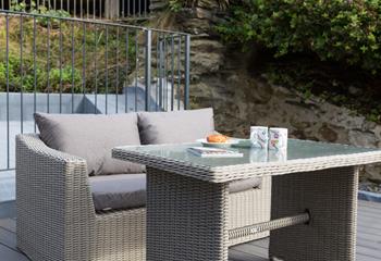 Soak up the summer sunshine on the decking each morning.