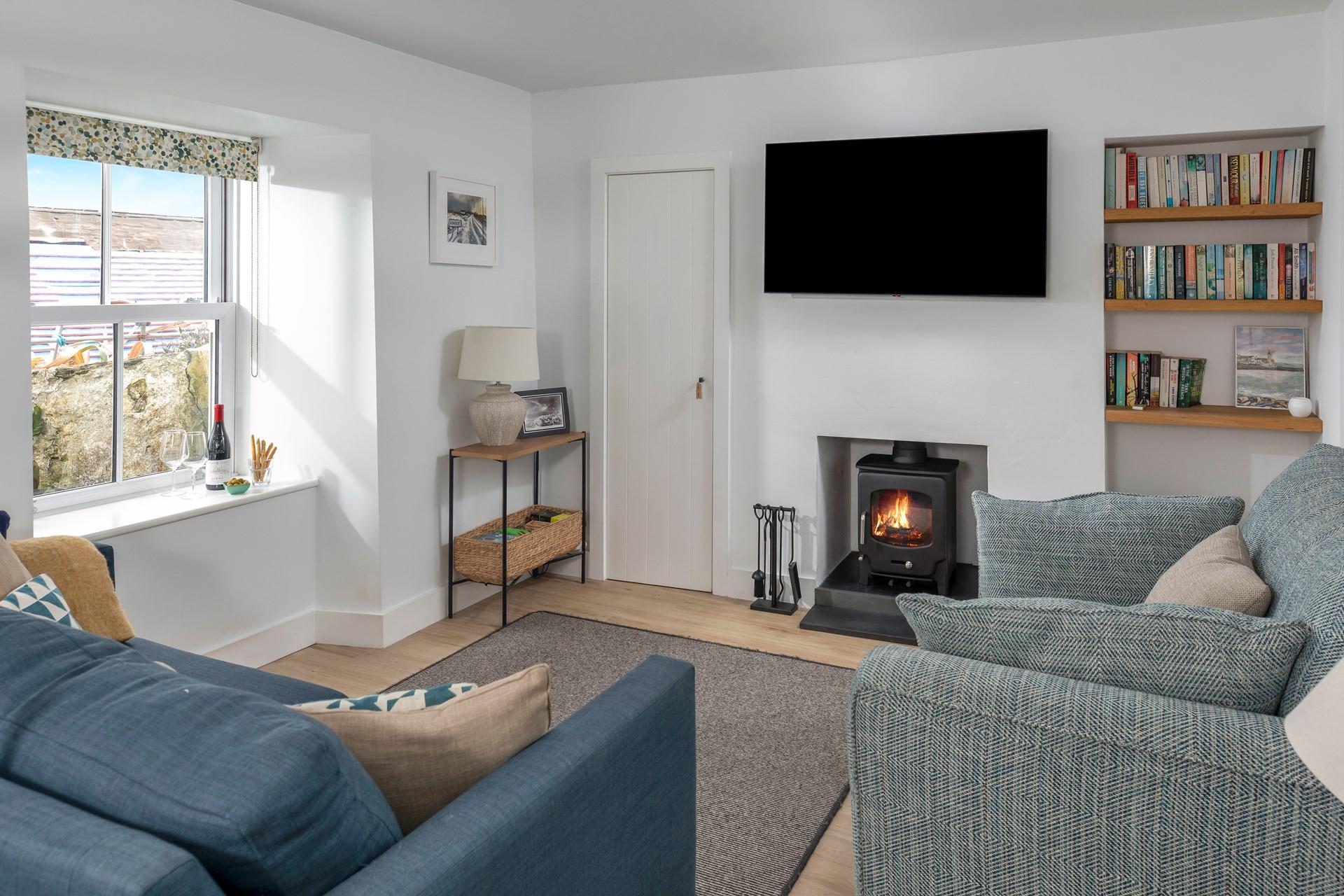 Enjoy a movie night in the cosy sitting room with all the family.