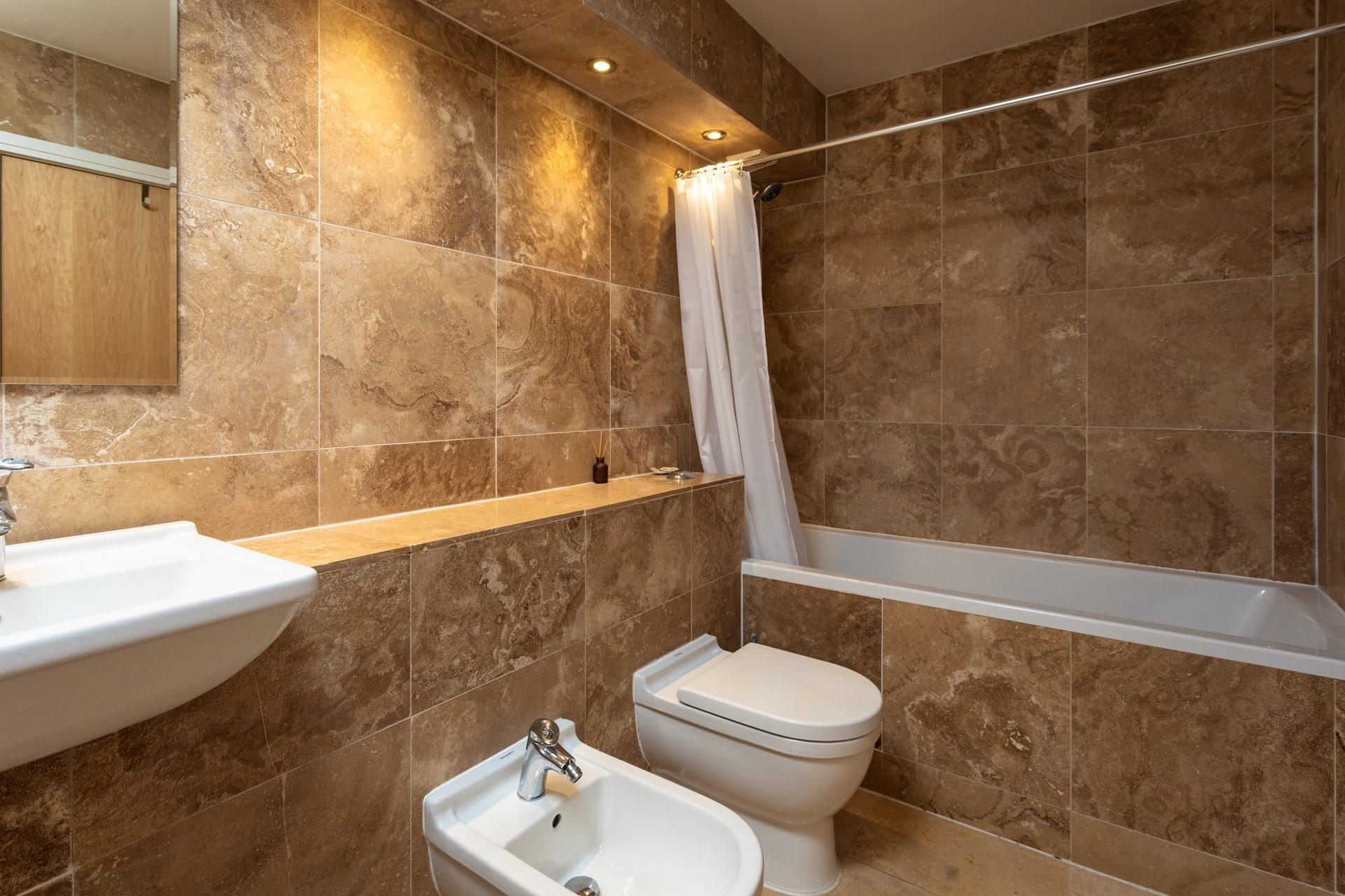 Walk the nearby coastal path, then relax with a reviving bubble bath.