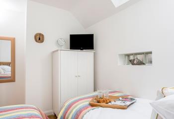 The twin bedroom is lovely and light with quirky features.