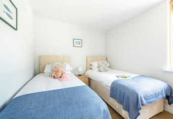The twin beds are perfect for children or young adults to tuck into each night.