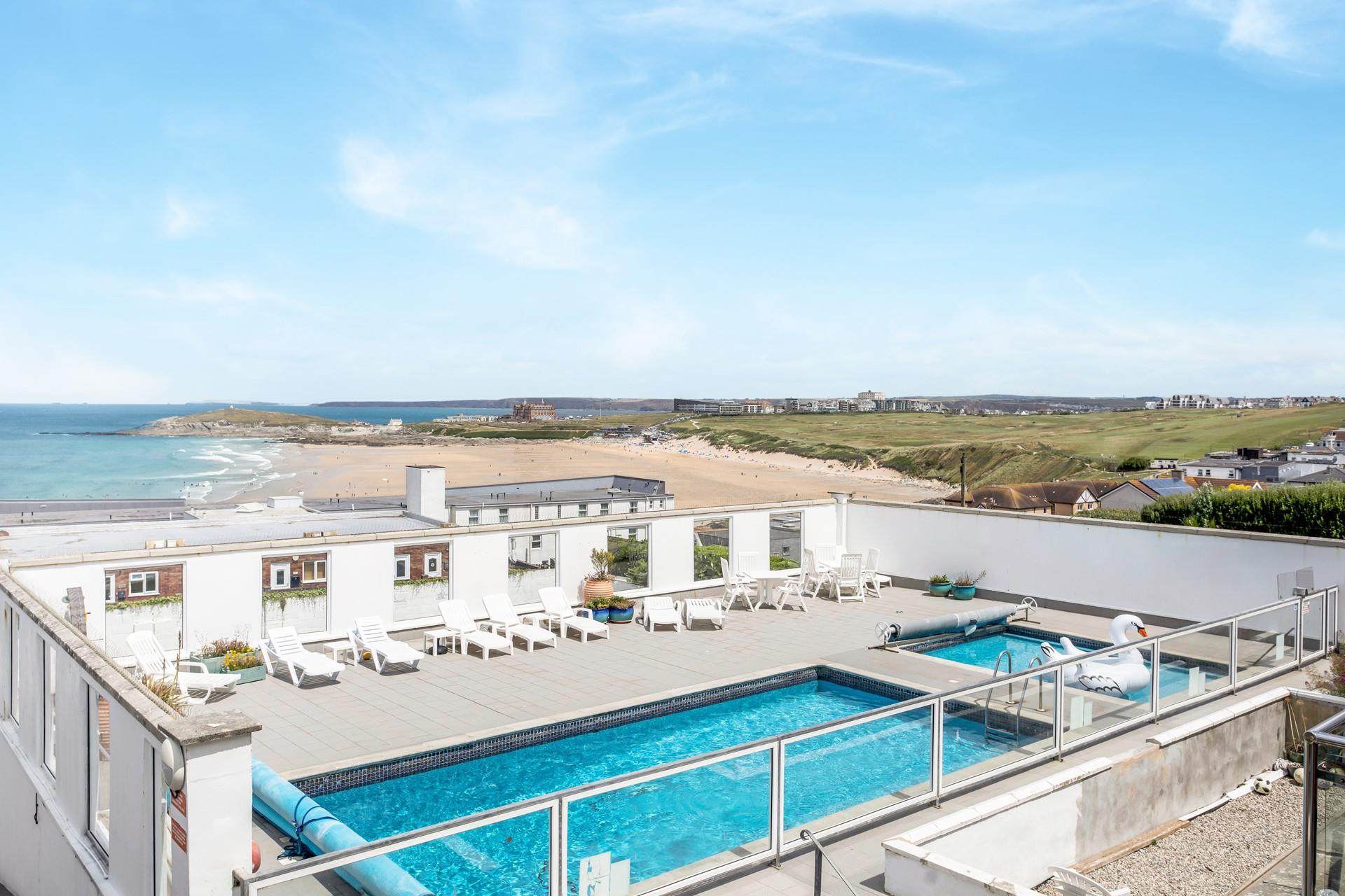 Breathtaking views across the pool and down to the sand.