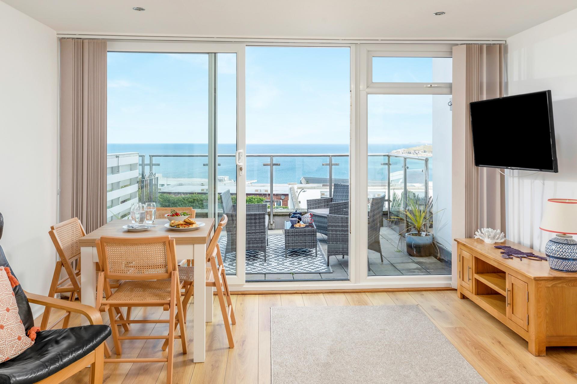 Open plan living and dining make the most of the view.