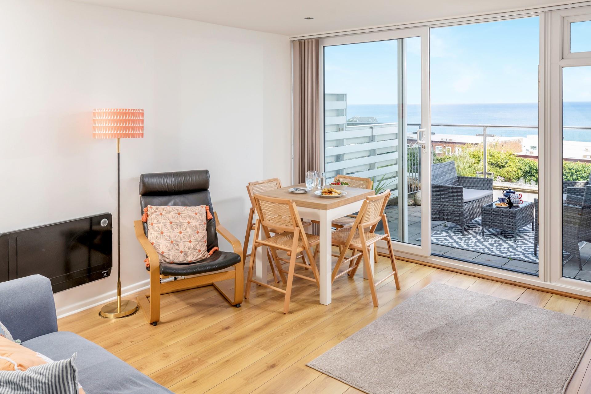 Enjoy breakfast with a view, from the living area or balcony.