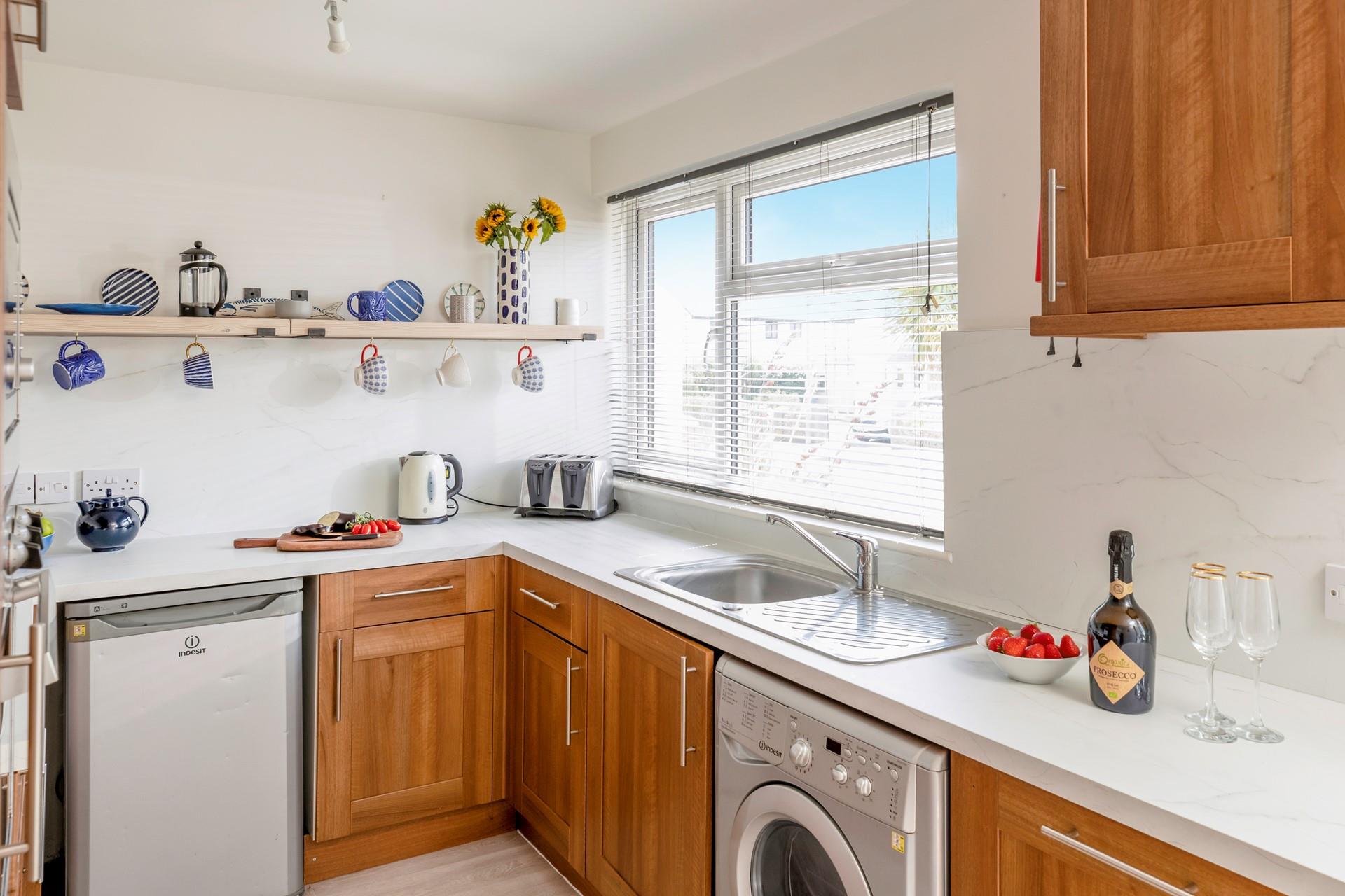 The kitchen has all you need for convenient cooking and dining.