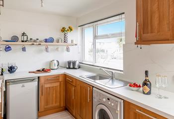 The kitchen has all you need for convenient cooking and dining.