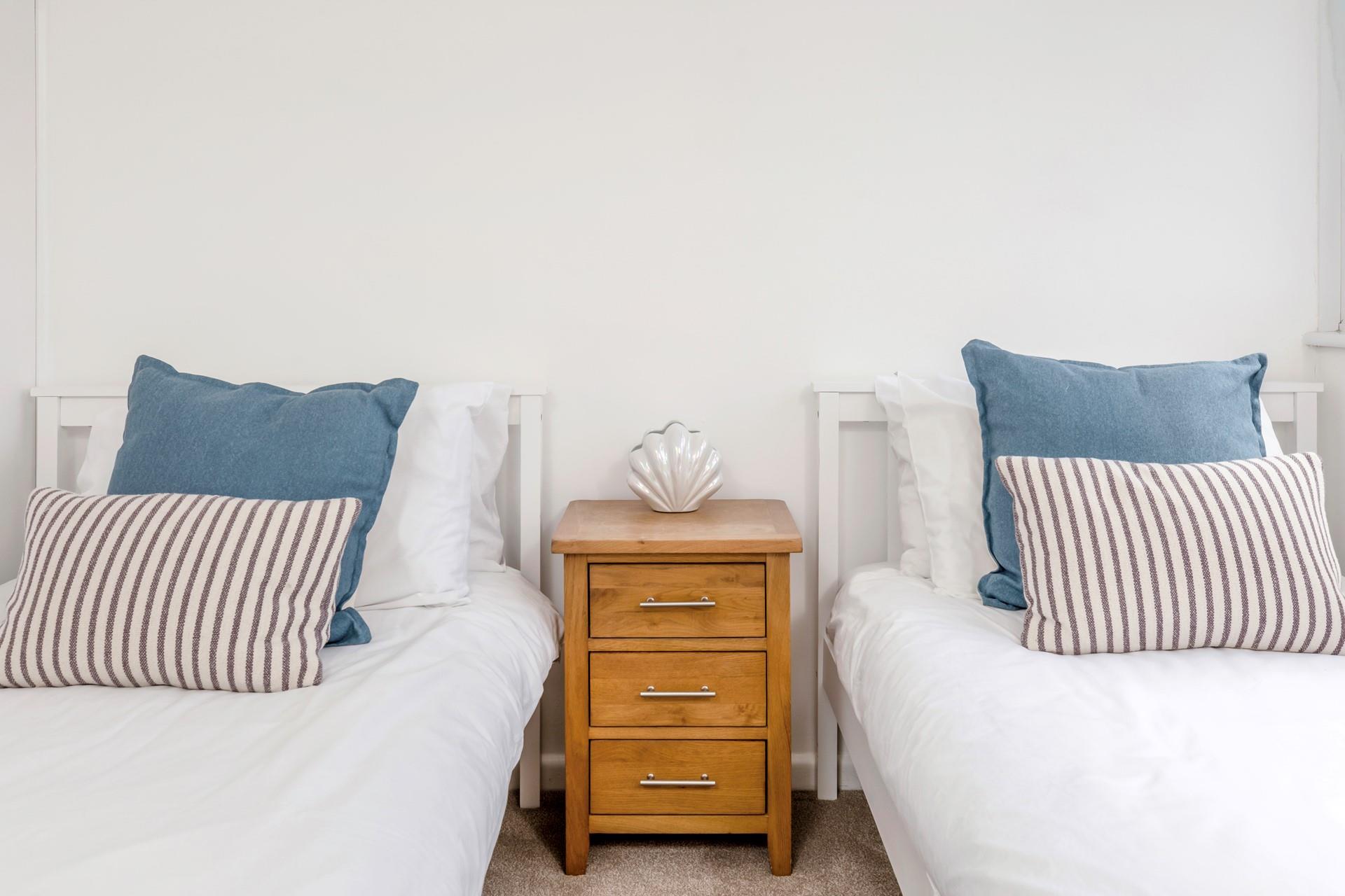 Touches of coastal decor adorn this seaside retreat.