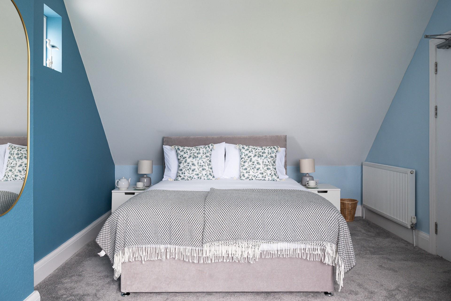 Beautiful blues reflect the coastal location.