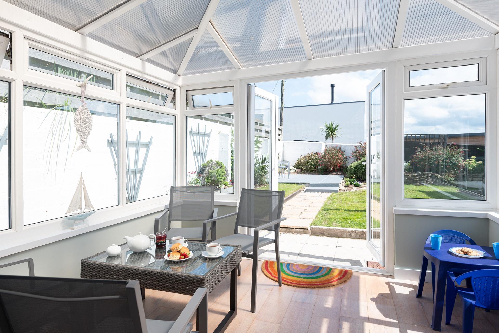 Spend sunny afternoons in the conservatory or garden.