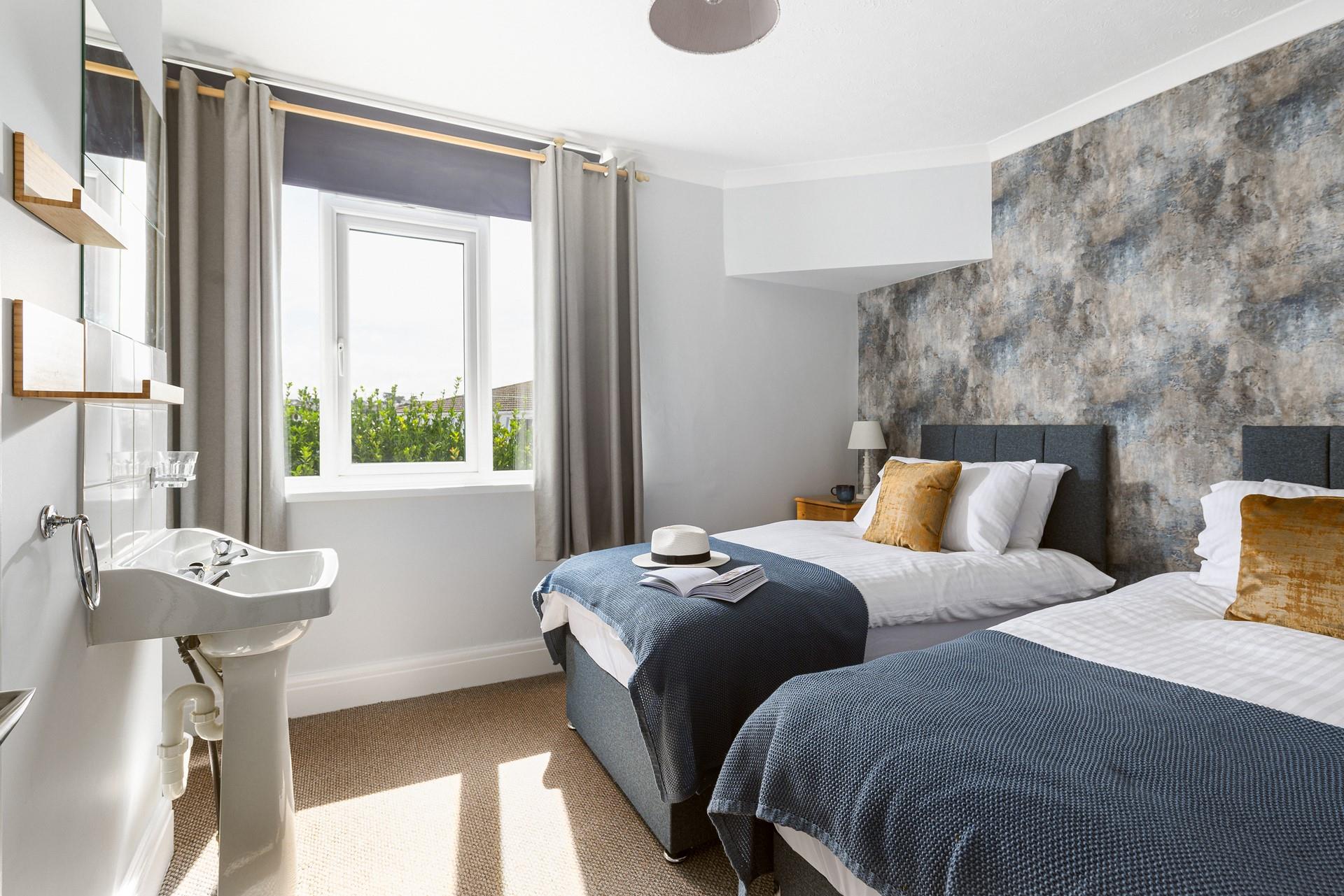 The ground floor twin bedroom is ideal for family or friends holidaying together.