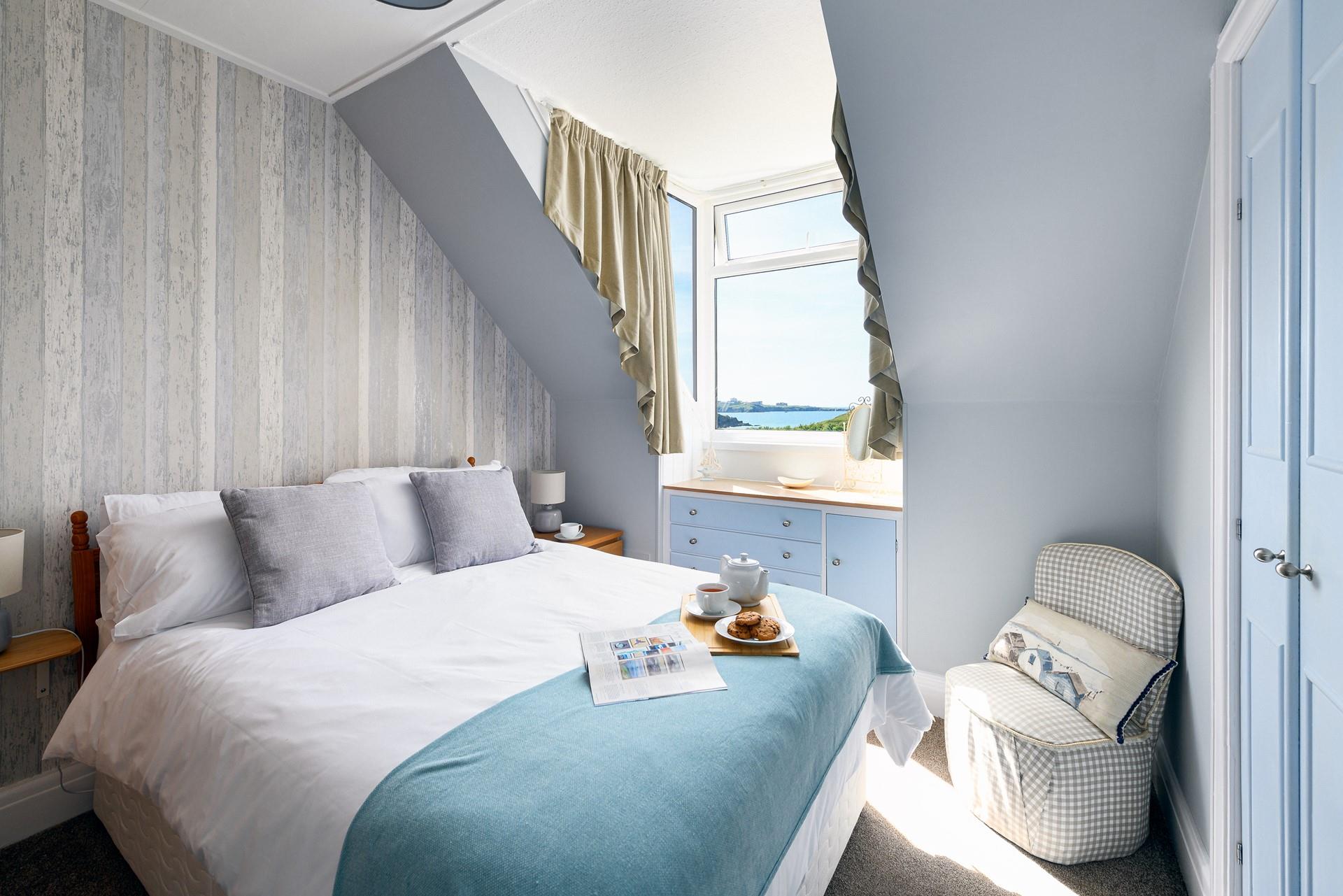 Relax by the sea, with the shoreline just moments away.