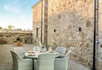 The courtyard to the side of the property is perfect for al fresco dining.