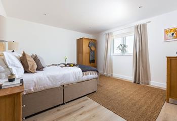 The bedrooms are stylishly decorated with a calming colour scheme.