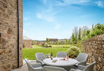 The courtyard to the side of the property is perfect for al fresco dining.