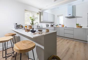 The kitchen has plenty of worktop space for preparing hearty meals and breakfasts.
