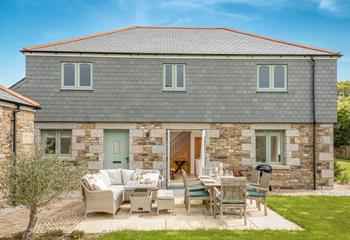 The lawned garden and patio are perfect for al fresco nights.