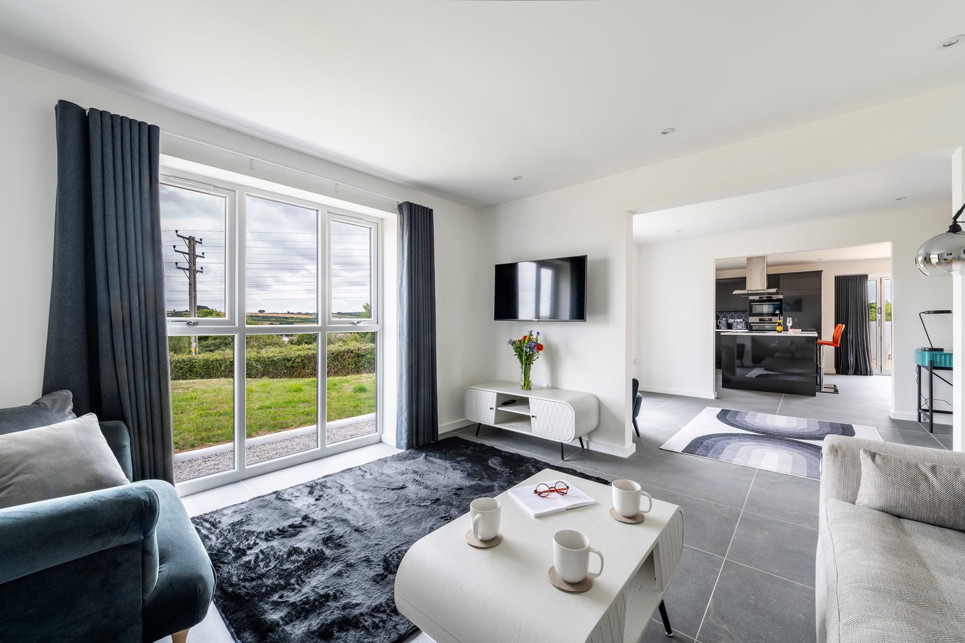 Spend cosy evenings in the sitting room with a family favourite movie on the TV.