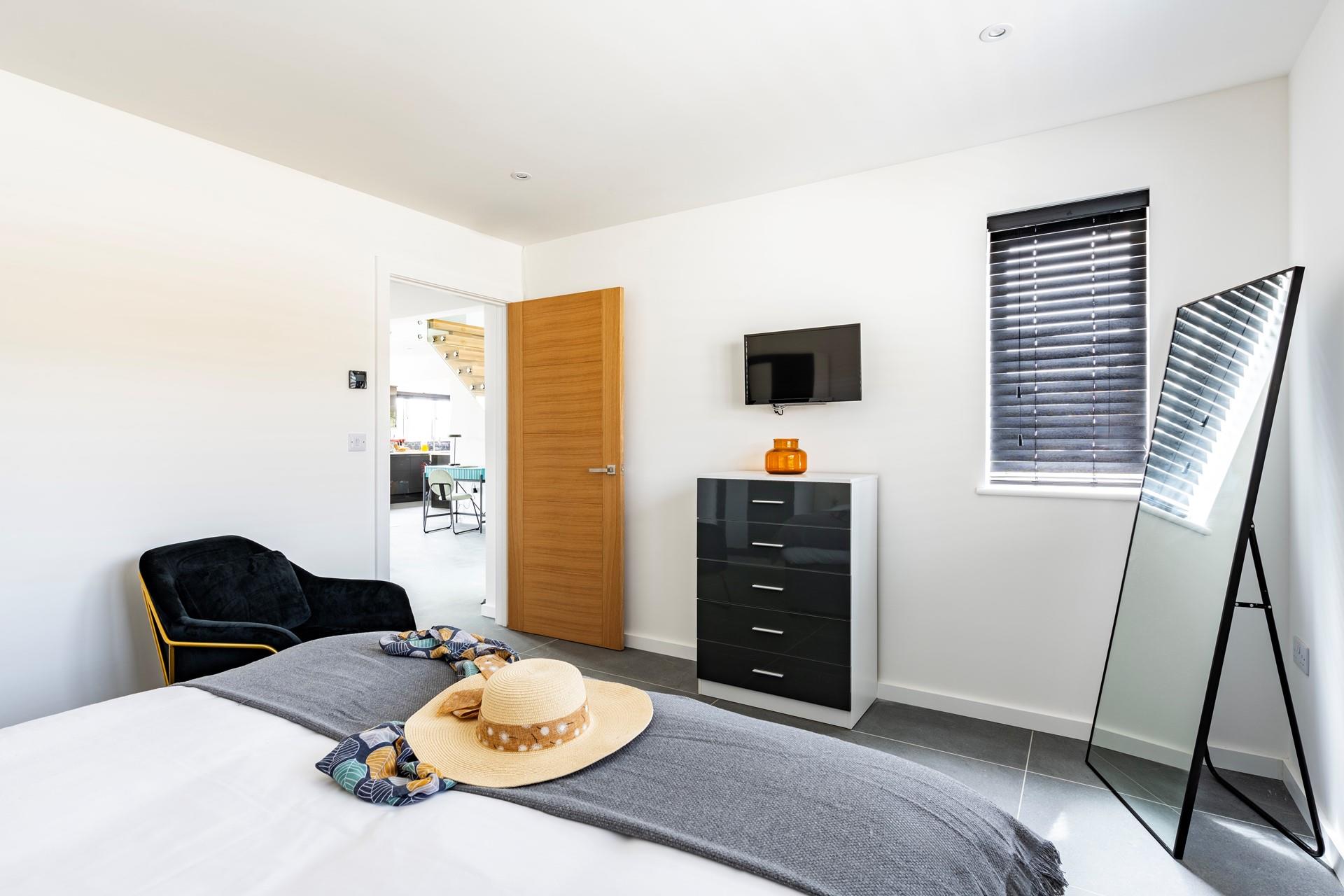 Check the day's outfit in the large mirror and head out to explore.