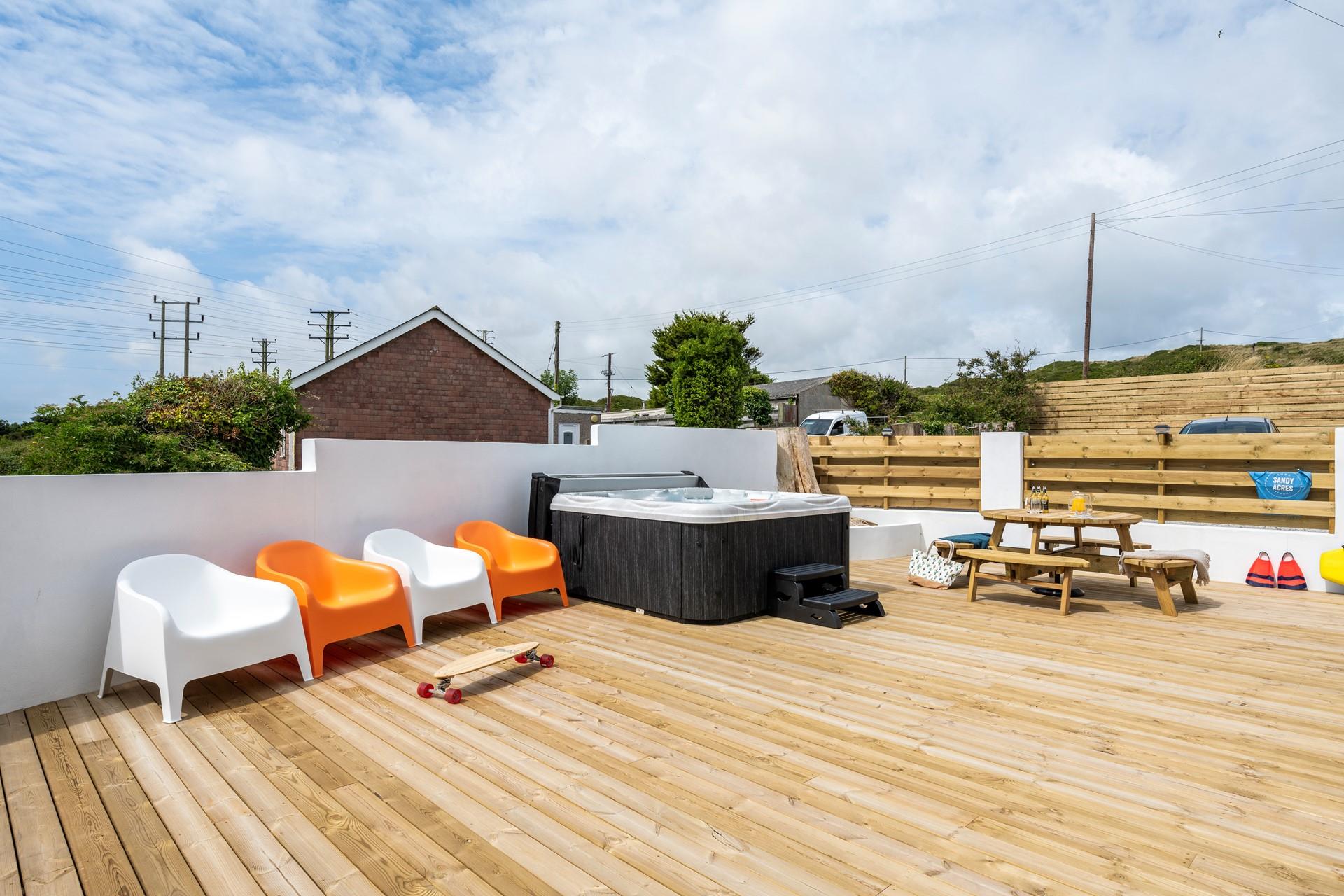 Take a dip in the luxurious hot tub as the sun comes down.