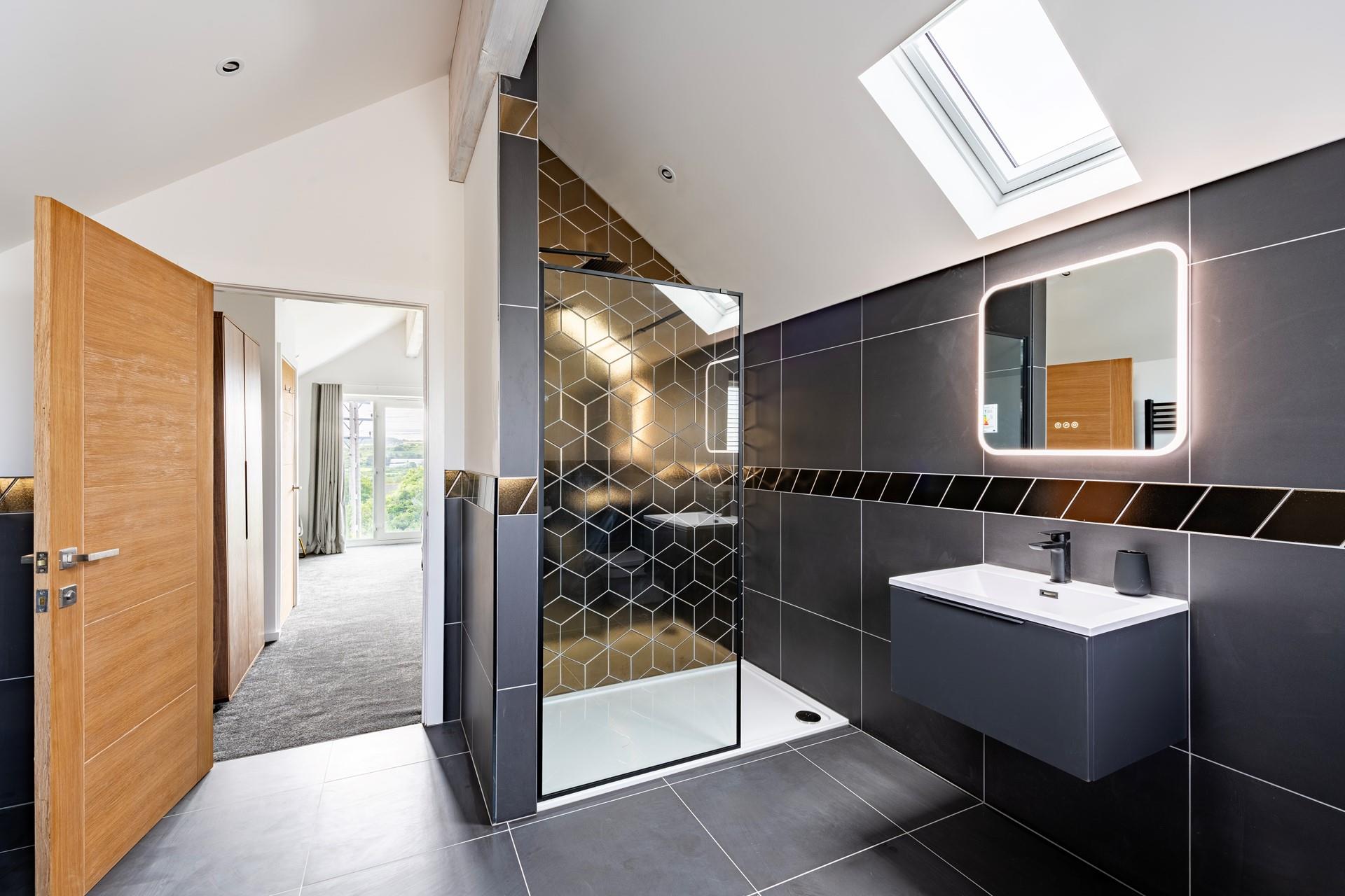 The ensuite bathroom is super spacious for getting ready in the morning.