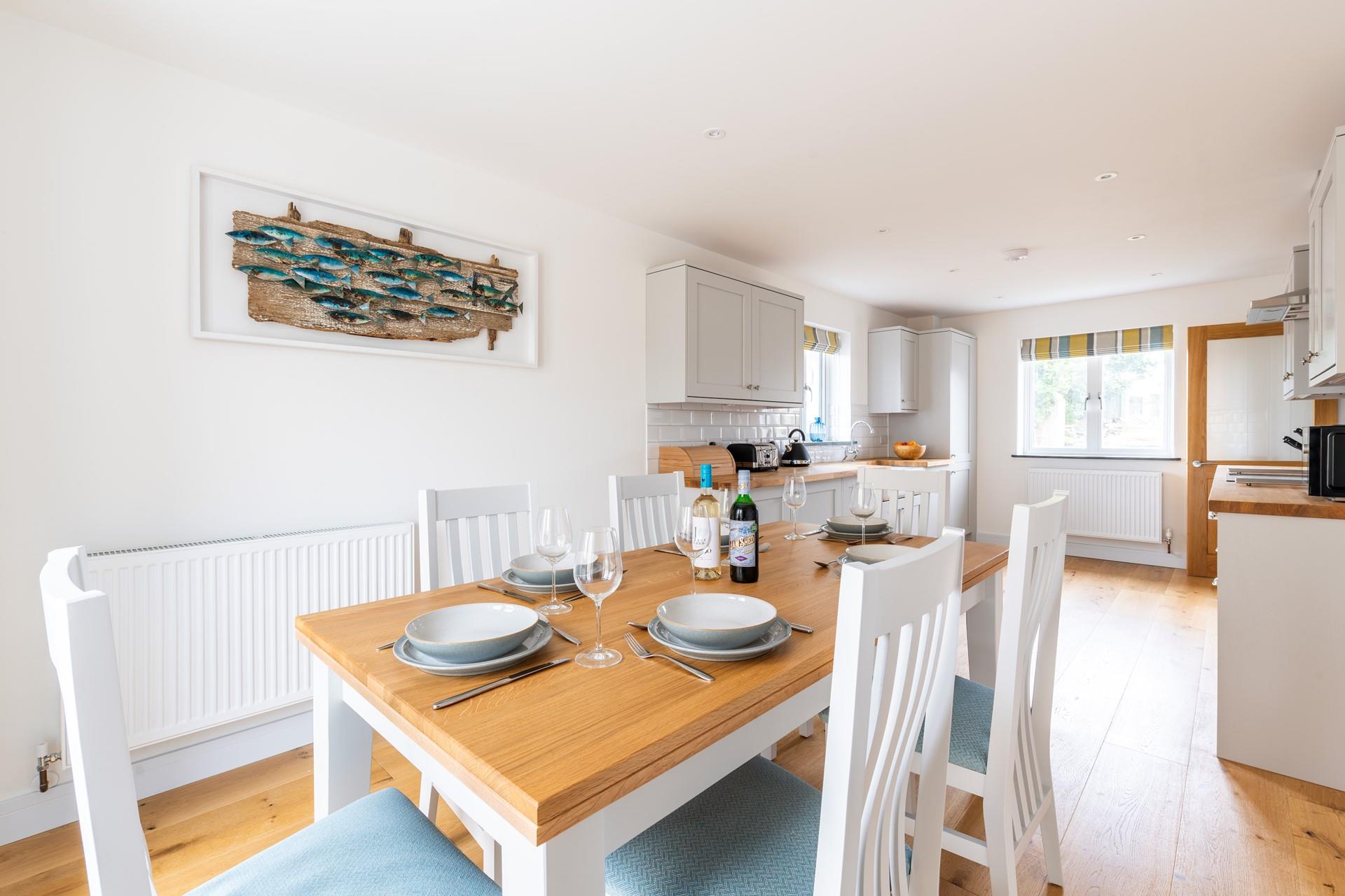 Gather around the dining table and tuck into a delicious meal surrounded by your family.