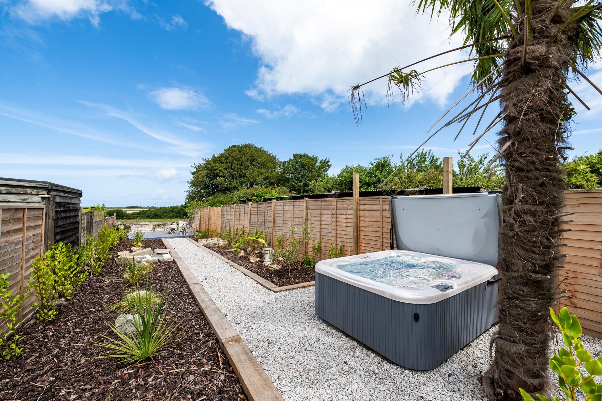 Take a dip in the bubbling hot tub as the sun comes down on another day.