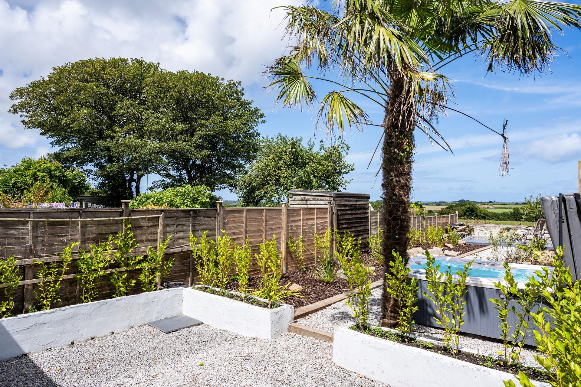 Stargaze from the hot tub with a glass of bubbles in hand.