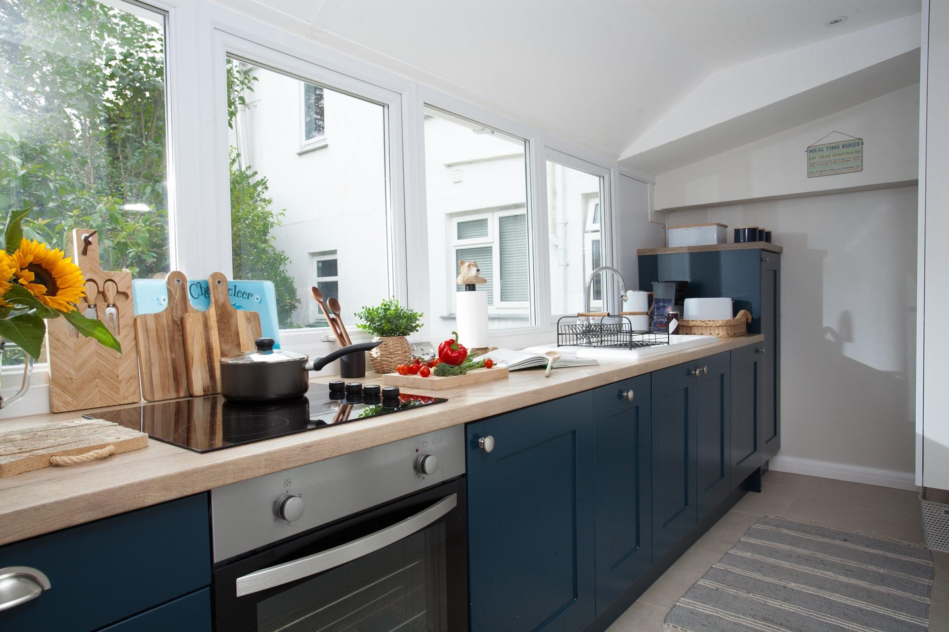 The elegant kitchen is a dream for the family foodie to cook in.