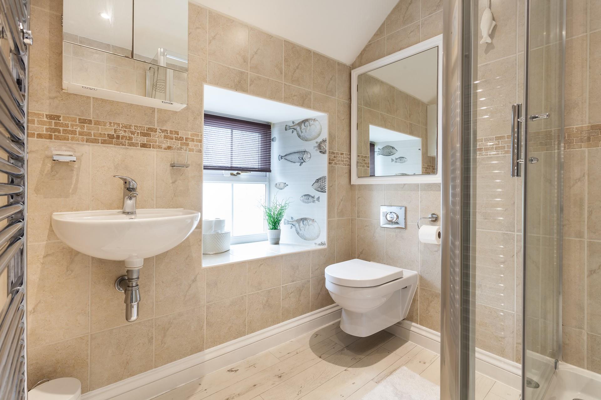 Get ready for the day's adventures in the stylish shower room.