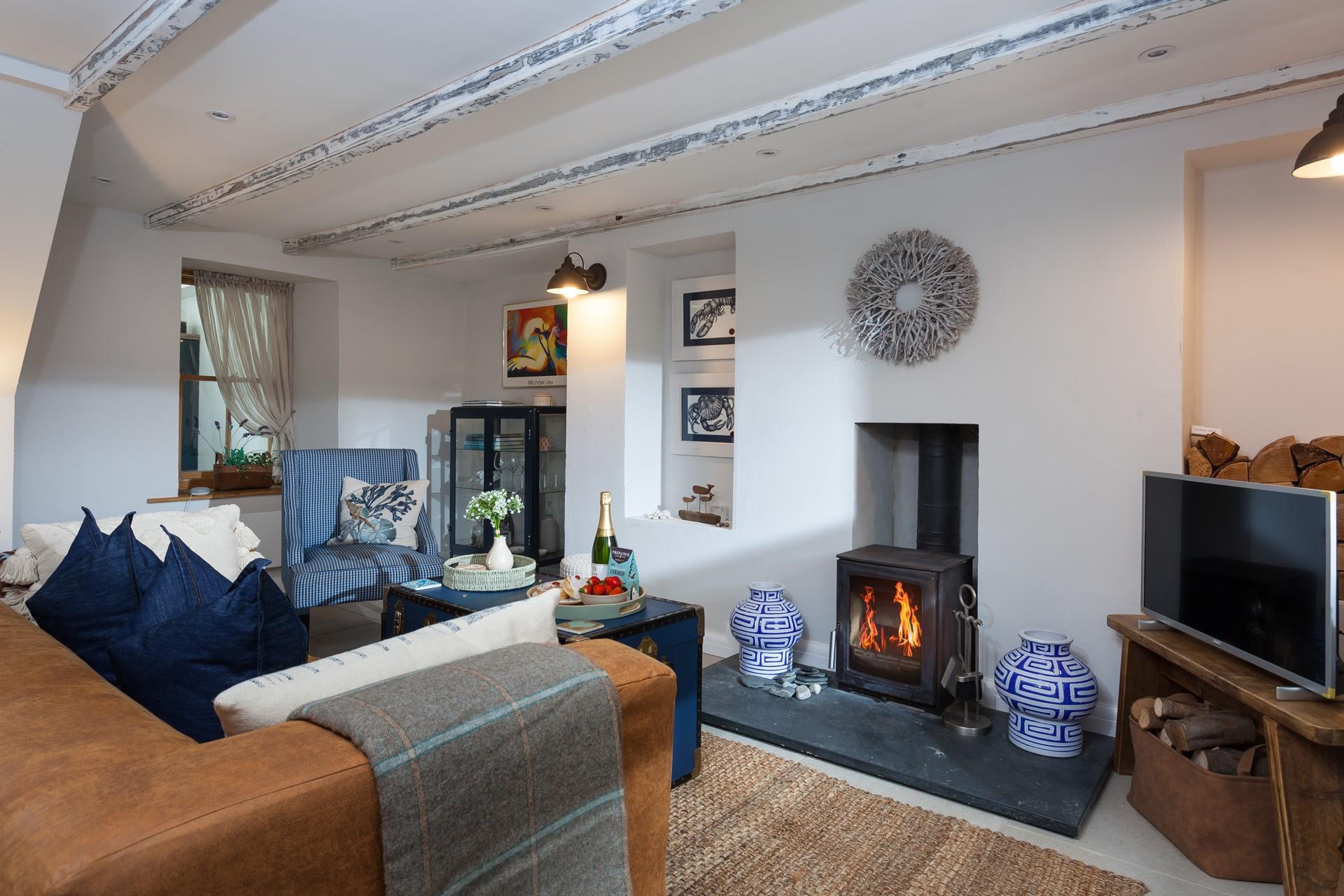 On milder evenings, get cosy around the idyllic woodburner.