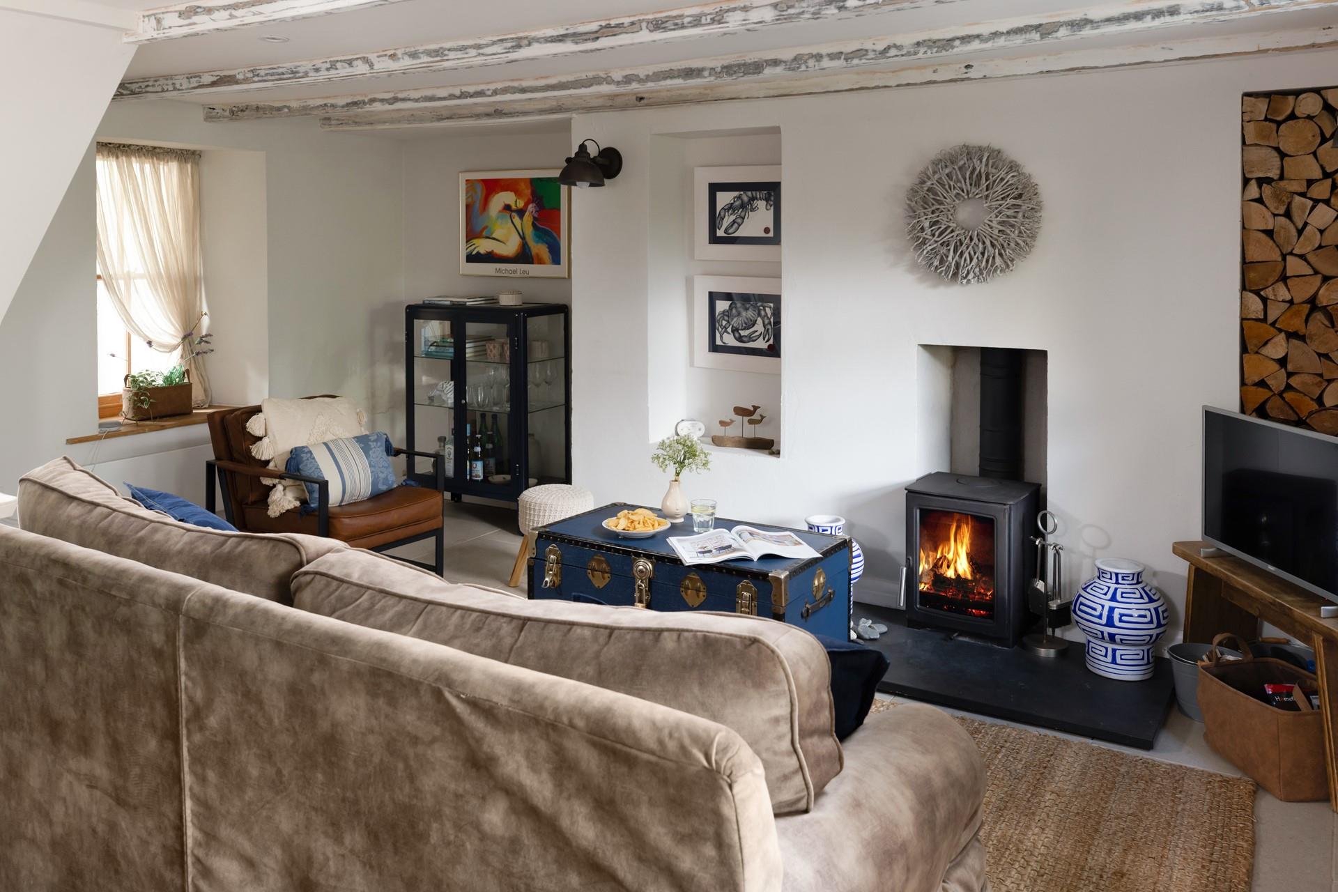 On milder evenings, get cosy around the idyllic woodburner.
