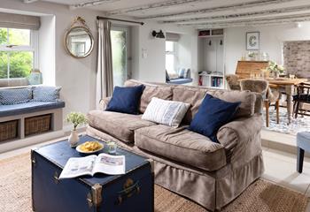 Traditional features are beautifully combined with modern furnishings to create a stunning bolthole.