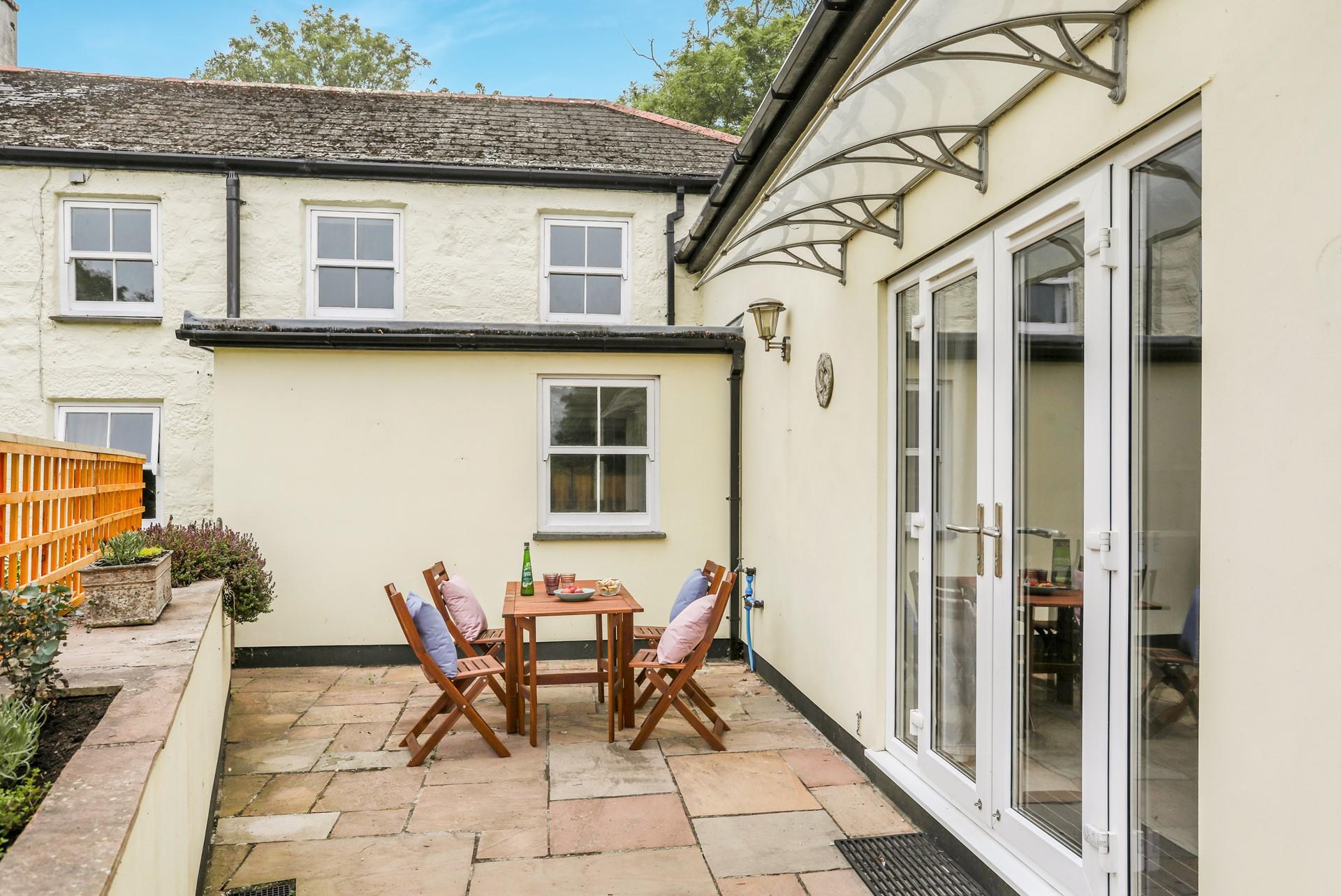 On sunny afternoons, enjoy al fresco dining on the patio.