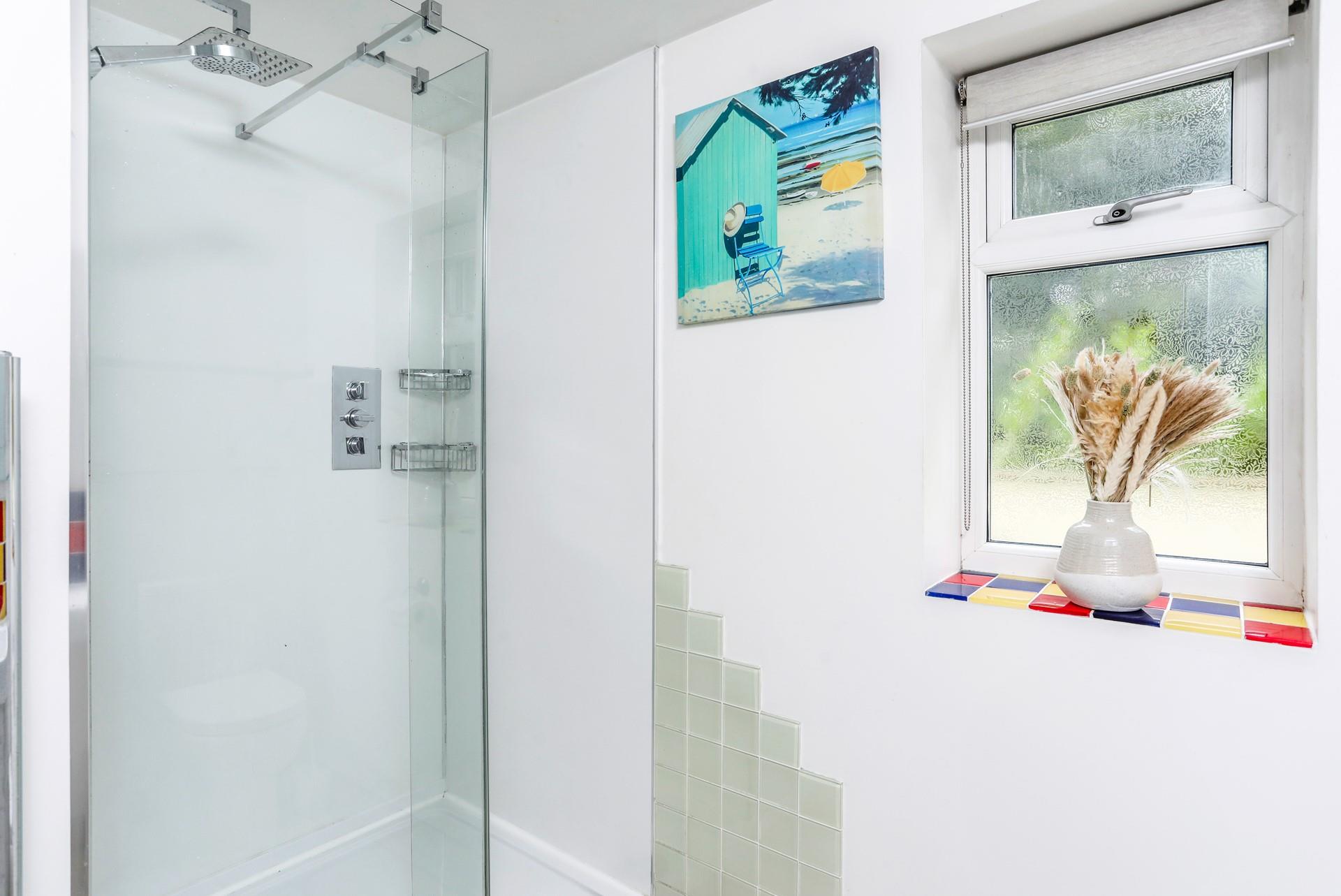 Wash off sandy toes in shower after a day on tropical Porthminster beach in St Ives.