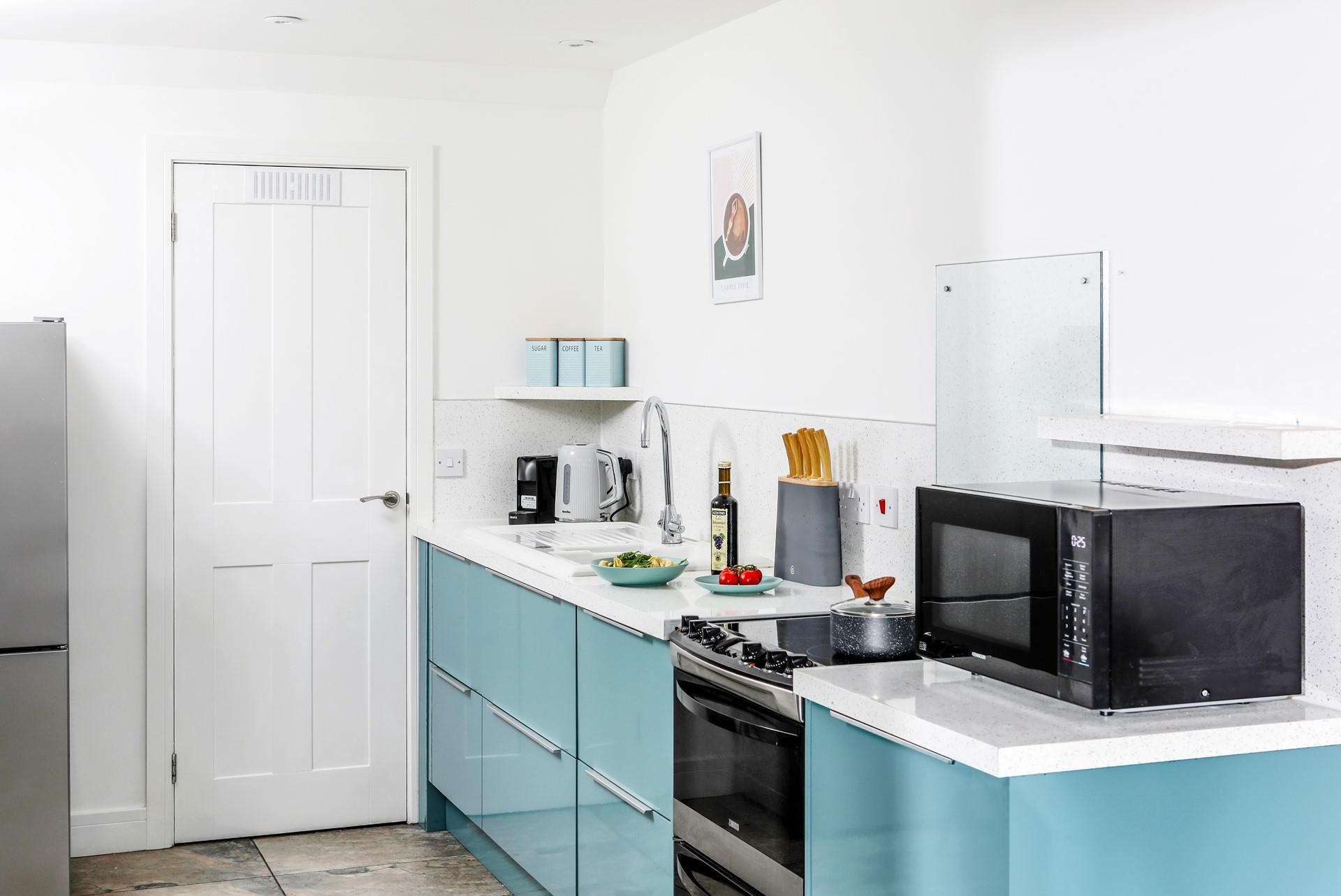 The kitchen is fully equipped for preparing hearty breakfasts and tasty suppers.