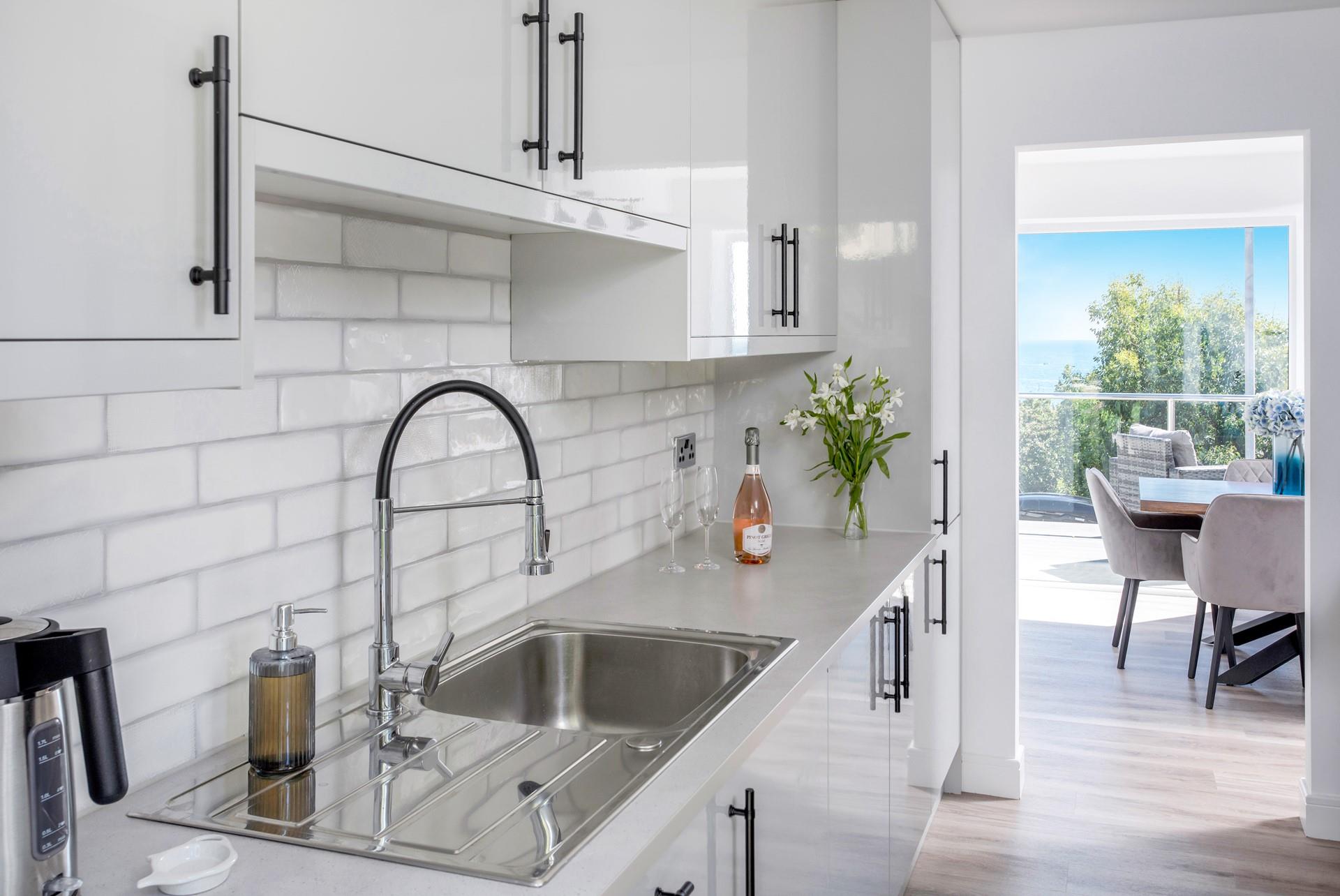 The sleek and stylish kitchen is a keen foodie's dream.