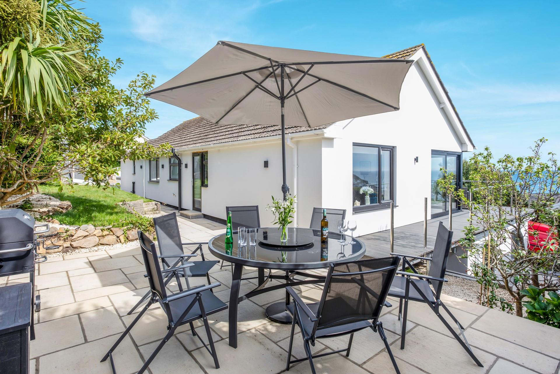 Dine alfresco, with a glass in hand under the Cornish sun.