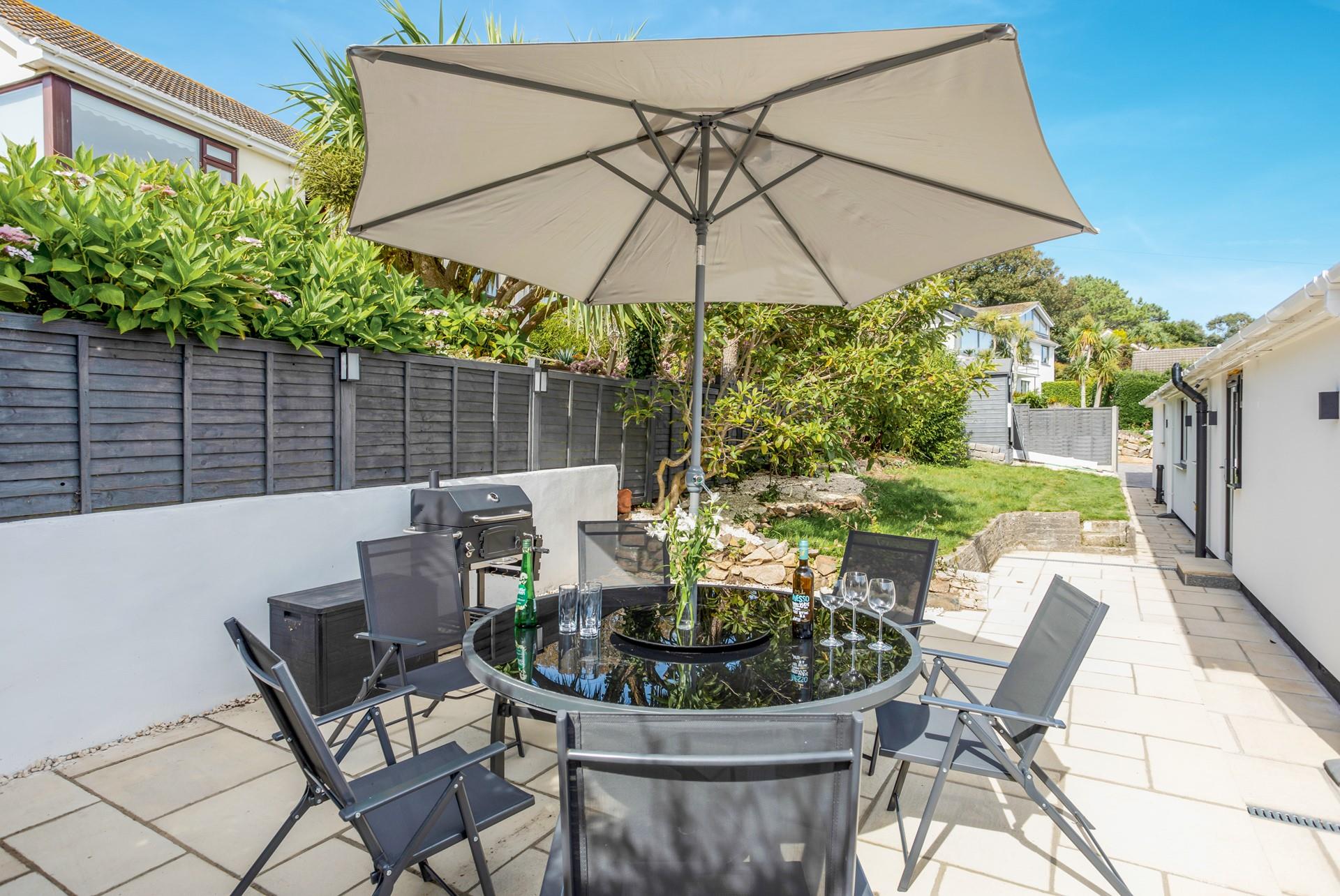 The secluded courtyard offers sea glimpses too.